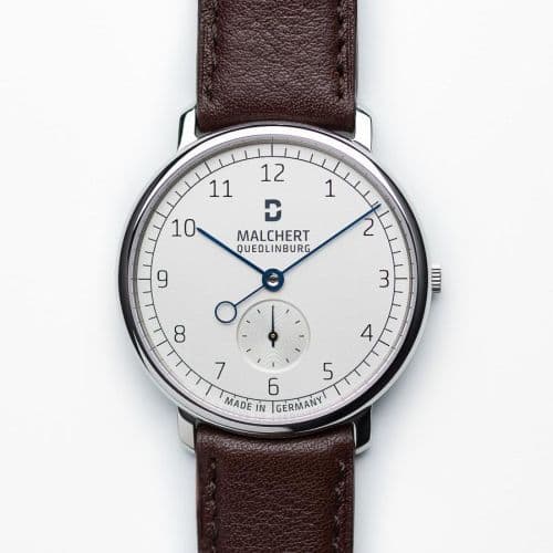 D. Malchert Schlossberg